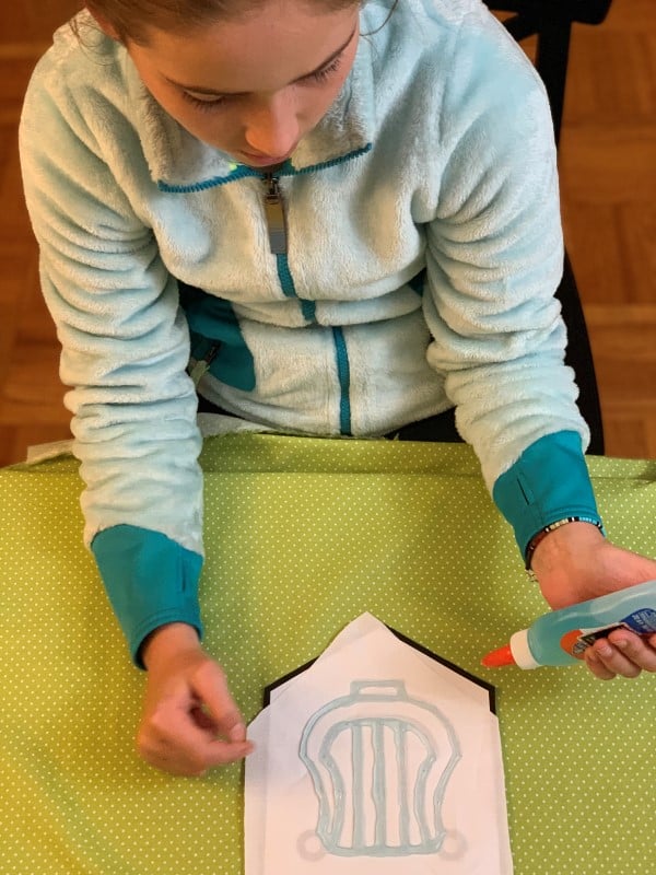 St. Patrick's Day craft for kids is making a pennant with Irish Symbols